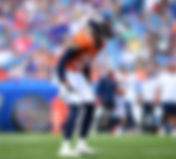 Denver Broncos professional football player on the field during a game